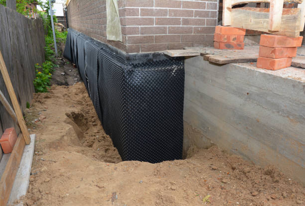 SJ Waterproofing Pros technician performing targeted Exterior Waterproofing assessment in Clairfield, TN